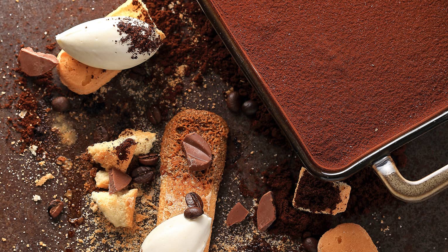 Looking down at cocoa cake topping, chocolate pieces,Tiramisu ingredients 